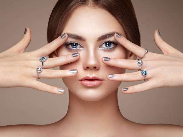 Fashion portrait of young beautiful woman with jewelry