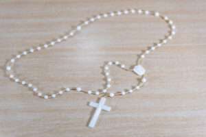 dainty cross necklace with pearls