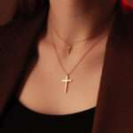 Dainty cross necklaes with gold