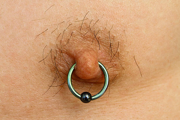 A young man's pierced nipple.